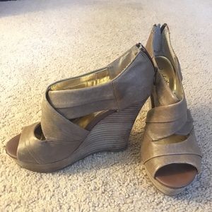 Size 7.5 tall Seychelles brown wedge heels.